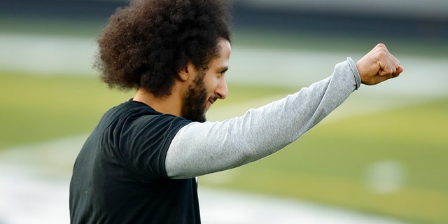 Free-agent quarterback Colin Kaepernick participates in a workout for NFL football scouts and media, Saturday, Nov. 16, 2019, in Riverdale, Ga. (AP Photo/Todd Kirkland)