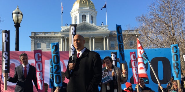 Democratic presidential candidate Sen. Cory Booker of New Jersey headlines a rally outside the New Hampshire Statehouse after filing to place his name on the first-in-the-nation presidential primary, in Concord, NH on Nov. 15, 2019