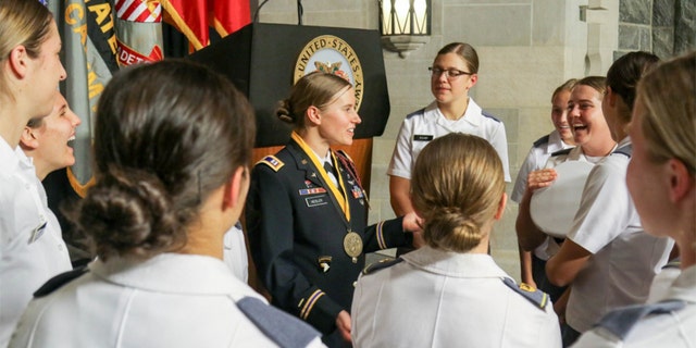 Gordon talks with members of the West Point Women's Soccer team after the award ceremony. (U.S. Army photo by Brandon O'Connor)