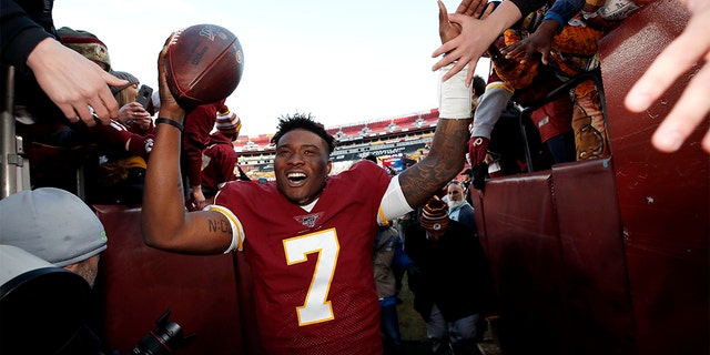 Haskins running off the field at the end of Sunday's game. (AP Photo/Alex Brandon)