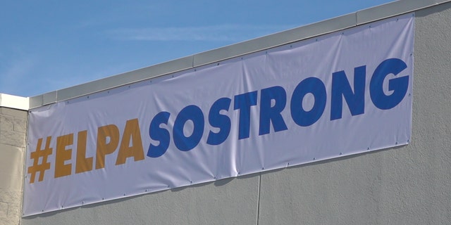 Walmart unveiled an "El Paso Strong" banner before customers were allowed into its store where a gunman killed and injured dozens on Aug. 3. (Fox News/Charles Watson)