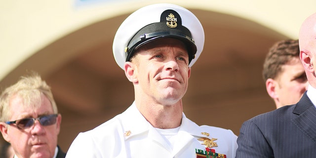 SAN DIEGO, CA - JULY 02:R, Navy Special Operations Chief Edward Gallagher celebrates after being acquitted of premeditated murder at Naval Base San Diego July 2, 2019 in San Diego, California. Gallagher was found not guilty in the killing of a wounded Islamic State captive in Iraq in 2017. He was cleared of all charges but one of posing for photos with the dead body of the captive. (Photo by Sandy Huffaker/Getty Images)