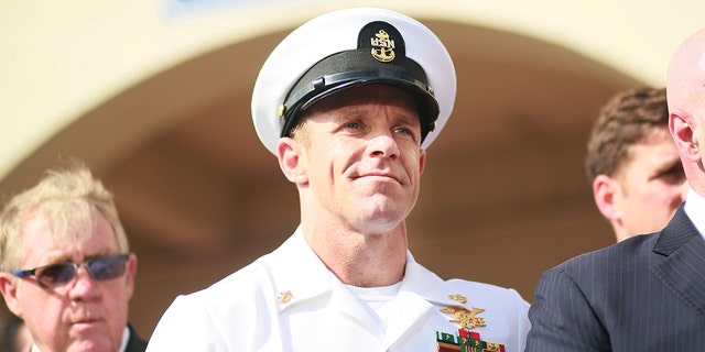 Navy Special Operations Chief Edward Gallagher celebrates after being acquitted of premeditated murder at Naval Base San Diego, Calif., on July 2, 2019. (Photo by Sandy Huffaker/Getty Images)