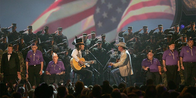 Musicians Big Kenny Alphin (L) and John Rich of Big and Rich perform onstage during the 41st Annual Academy Of Country Music Awards held at the MGM Grand Garden Arena on May 23, 2006, in Las Vegas, Nevada.