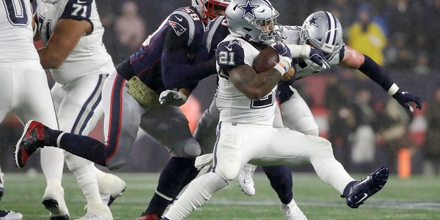 Dallas Cowboys running back Ezekiel Elliott carries the ball as New England Patriots linebacker Jamie Collins, left, gives chase in the first half of an NFL football game, Sunday, Nov. 24, 2019, in Foxborough, Mass. (AP Photo/Elise Amendola)