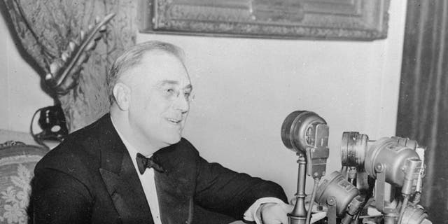 President Franklin D. Roosevelt talks to the nation in a fireside chat from the White House in this November 1937 photo.