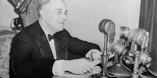 President Franklin D. Roosevelt talks to the nation in a fireside chat from the White House in this November 1937 photo.