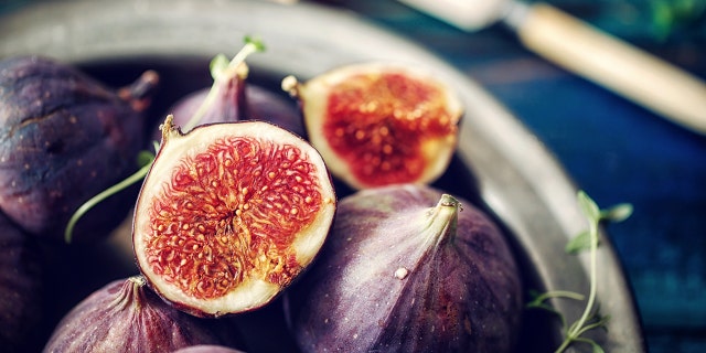 Depending on where your figs come from, they might be pollinated by fig wasps, some of which may die inside the fig.