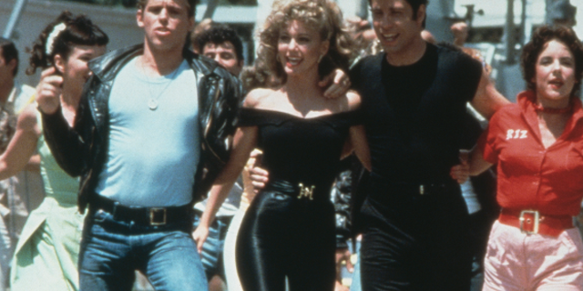 Olivia Newton-John and John Travolta appear in