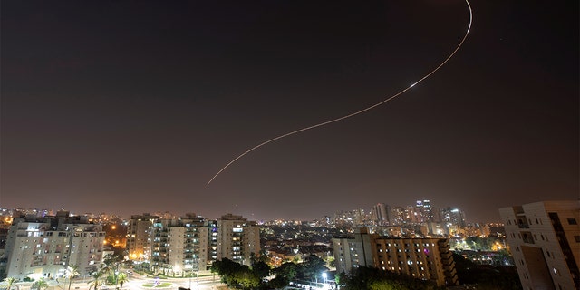 An Iron Dome anti-missile system fires interception missiles as rockets are launched from Gaza toward Israel, as seen from the city of Ashkelon, Israel, Nov. 13, 2019. (REUTERS/ Amir Cohen)