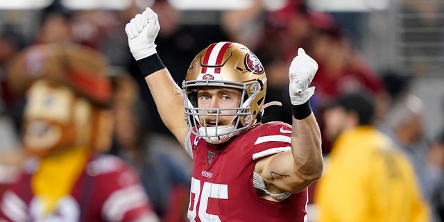 San Francisco 49ers tight end George Kittle (85) celebrates after scoring against the Green Bay Packers during the second half of an NFL football game in Santa Clara, Calif., Sunday, Nov. 24, 2019. (AP Photo/Tony Avelar)