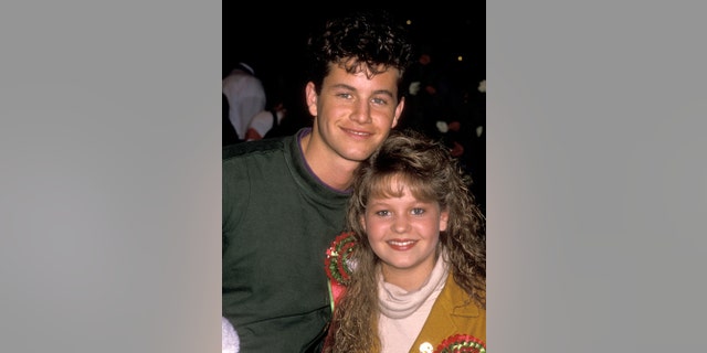 Kirk and Candace Cameron attend the Hollywood Christmas Parade on Nov. 27, 1989, in Hollywood, Calif.