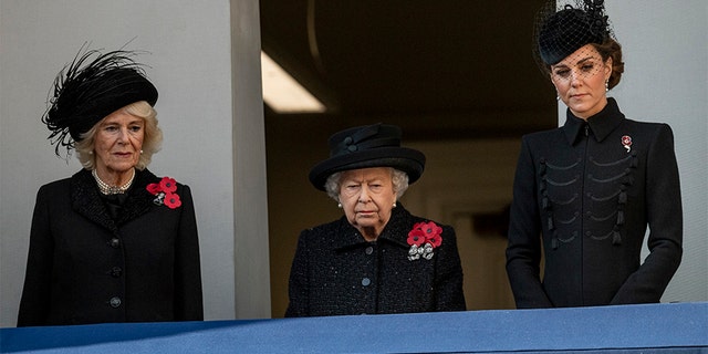 gardening Queen Elizabeth II (center) with Camilla, Duchess of Cornwall (left) and Catherine, Duchess of Cambridge attend the annual Remembrance Sunday memorial at The Cenotaph on November 10, 2019, in London, England.
