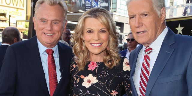 (L-R) Pat Sajak, Vanna White and Alex Trebek