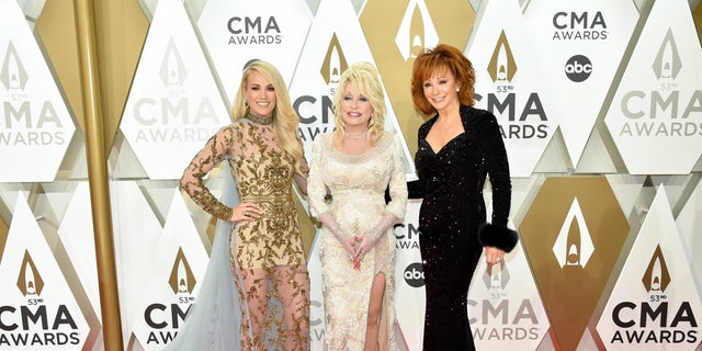 Carrie Underwood, Dolly Parton and Reba McEntire attend the 53rd Annual County Music Association (CMA) Awards. (Photo by John Shearer/WireImage,)