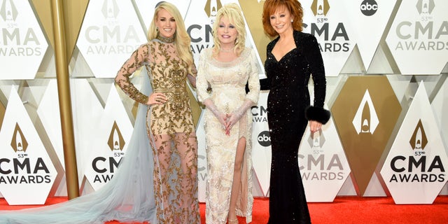 Carrie Underwood, Dolly Parton and Reba McEntire attend the 53rd Annual County Music Association (CMA) Awards. (Photo by John Shearer/WireImage,)