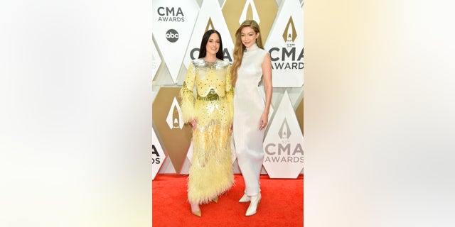 Kacey Musgraves and Gigi Hadid at the 2019 CMA Awards. (Photo by John Shearer/WireImage,)