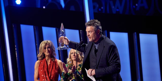 Blake Shelton accepts his CMA Award for Single of the Year. (Photo by John Shearer/Getty Images)