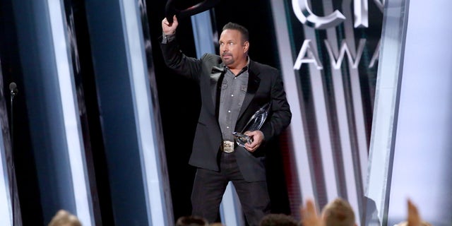 Garth Brooks accepts an award onstage during the 53rd annual CMA Awards at the Bridgestone Arena on November 13, 2019 in Nashville, Tennessee. (Photo by Terry Wyatt/Getty Images,)