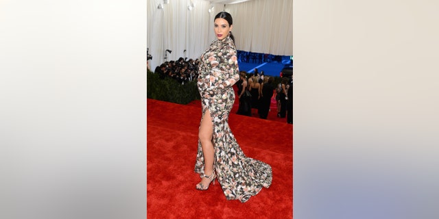 Kim Kardashian attends the Costume Institute Gala for the "PUNK: Chaos to Couture" exhibition at the Metropolitan Museum of Art on May 6, 2013 in New York City. 