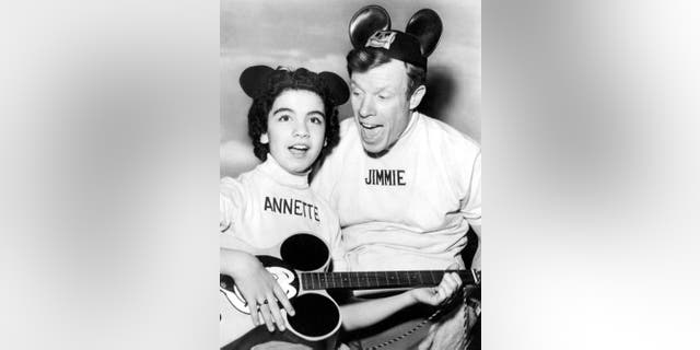 Annette Funicello and Jimmie Dodd on "The Mickey Mouse Club" television show, Hollywood, California, May 1956.