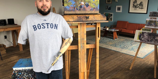 Artist and Iraq War veteran Pete Damon with his Google Doodle painting. (Pete Damon)