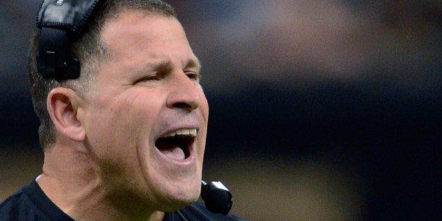 In this Dec. 29, 2013, file photo, then-Tampa Bay Buccaneers head coach Greg Schiano reacts on the sideline in the first half of an NFL football game against the New Orleans Saints in New Orleans.