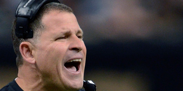 In this Dec. 29, 2013, record photo, then-Tampa Bay Buccaneers conduct manager Greg Schiano reacts on a sideline in a initial half of an NFL football diversion opposite a New Orleans Saints in New Orleans. 
