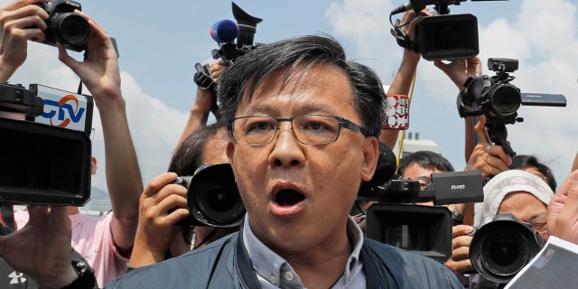 Hong Kong police say an anti-government supporter stabbed and wounded pro-Beijing lawmaker Junius Howho was campaigning for local elections.