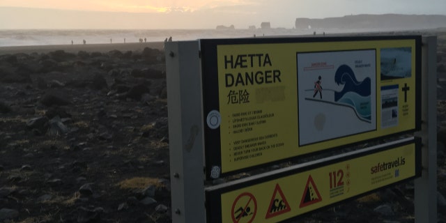 A warning sign at Reynisfjara Beach in Iceland as seen in October 2018.