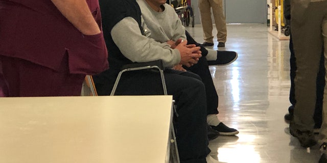 Immigrant detainees at Winn Correctional Center wait to be seen by full-time medical personnel. Their faces are concealed to protect their privacy.