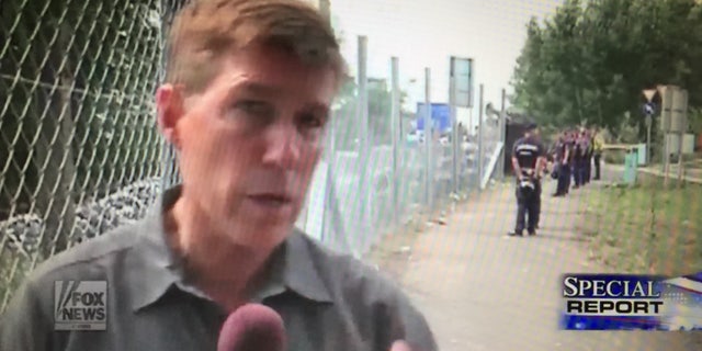 Greg Palkot covering migrants in Roszke, in the Hungary-Serbia border.