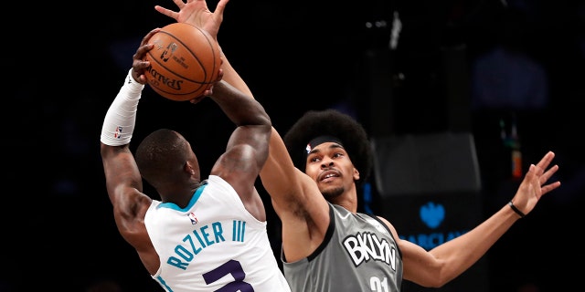 Brooklyn Nets center Jarrett Allen (31) defends against Charlotte Hornets guard Terry Rozier (3) during the second half of an NBA basketball game Wednesday, Nov. 20, 2019, in New York. The Nets won 101-91. (AP Photo/Kathy Willens)