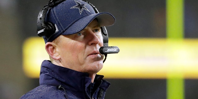 Latest Sports News: Dallas Cowboys head coach Jason Garrett watches from the sideline in the second half of an NFL football game against the New England Patriots, Sunday, Nov. 24, 2019, in Foxborough, Mass. (AP Photo/Steven Senne)