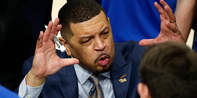 Pittsburgh coach Jeff Capel talks with his team during a timeout during the second half of the team's NCAA college basketball game against Robert Morris on Tuesday, Nov. 12, 2019, in Pittsburgh. Pittsburgh won 71-57. (AP Photo/Gene J. Puskar)