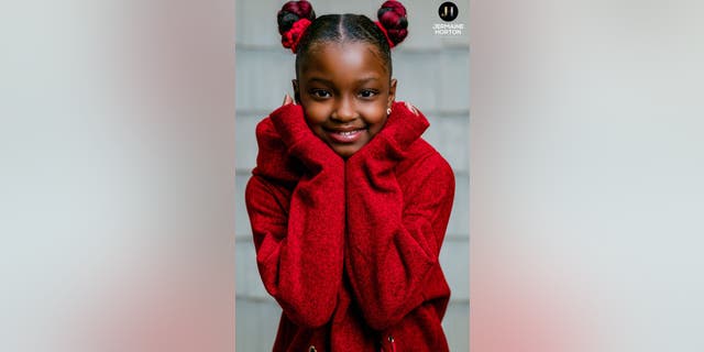 Marian Scott, 8, was all smiles during a recent, personalized photoshoot with Jermaine Horton Photography.