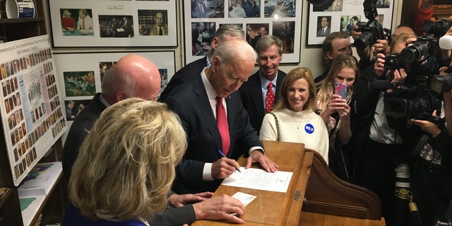 Former Vice President Joe Biden files to place his name on New Hampshire's first-in-the-nation presidential primary, at the Statehouse in Concord, NH on Nov. 8, 2019