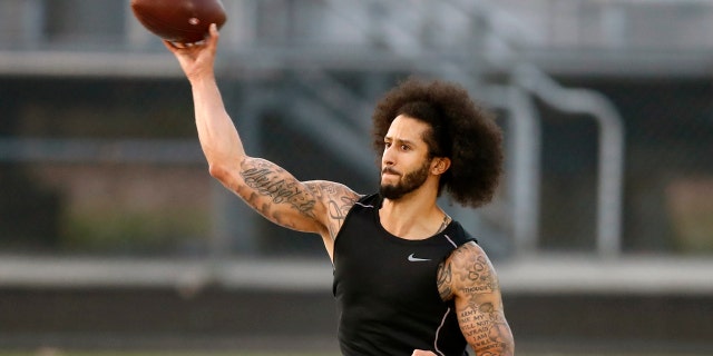 Colin Kaepernick releases a pass during Saturday's workout. (AP Photo/Todd Kirkland)