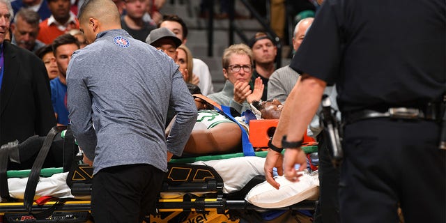 Kemba Walker #8 of the Boston Celtics is injured against the Denver Nuggets in the first half at Pepsi Center on November 22, 2019 in Denver, Colorado.(Photo by Jamie Schwaberow/Getty Images)
