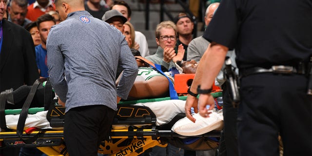 Kemba Walker #8 of the Boston Celtics is injured against the Denver Nuggets in the first half at Pepsi Center on November 22, 2019 in Denver, Colorado.(Photo by Jamie Schwaberow/Getty Images)