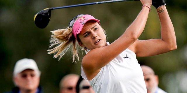 FILE - In this Thursday, April 4, 2019 file photo, Lexi Thompson hits her tee shot on the second hole during the first round of the LPGA Tour ANA Inspiration golf tournament at Mission Hills Country Club in Rancho Mirage, Calif. Thompson has gone five years since her only major title. (AP Photo/Chris Carlson, File)