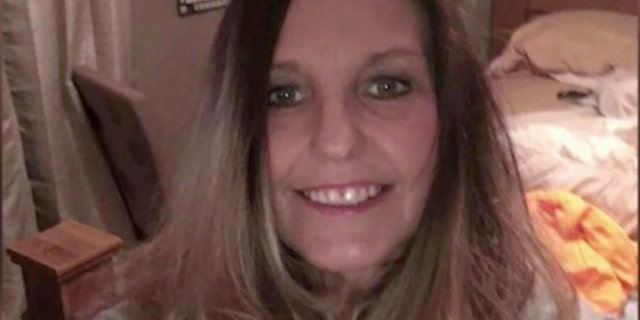 Once on the scene, police discovered Mary Matthews, 49, lying unresponsive on the bathroom floor, covered in blood and what appeared to be bite marks, according to a police report.