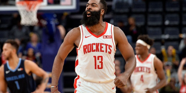 Houston Rockets guard James Harden (13) reacts after scoring a three-point basket in the second half of an NBA basketball game against the Memphis Grizzlies, Monday, Nov. 4, 2019, in Memphis, Tenn. (AP Photo/Brandon Dill)