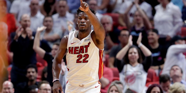 Miami Heat forward Jimmy Butler (22) reacts after scoring during the first half of the team's NBA basketball game against the Atlanta Hawks, Tuesday, Oct. 29, 2019, in Miami. (AP Photo/Lynne Sladky)