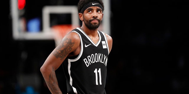 Brooklyn Nets guard Kyrie Irving (11) reacts during the first half of the team's NBA basketball game against the Indiana Pacers, Wednesday, Oct. 30, 2019, in New York. The Pacers won 118-108.