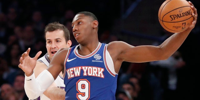 Sacramento Kings forward Nemanja Bjelica (88) defends New York Knicks guard RJ Barrett (9) during the first half of an NBA basketball game in New York, Sunday, Nov. 3, 2019. (AP Photo/Kathy Willens)