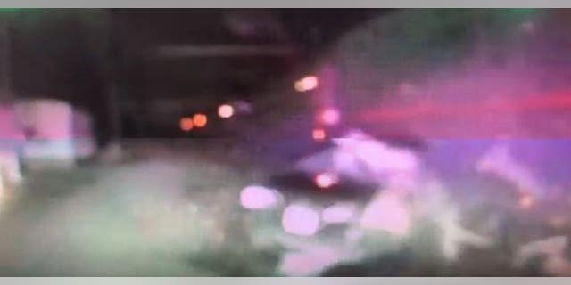 The moment after a westbound Amtrak train collided with a disabled vehicle on the tracks.