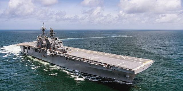 The future amphibious assault ship USS Tripoli (LHA 7) transits the Gulf of Mexico during builder’s trials held on July 15, 2019 - file photo.