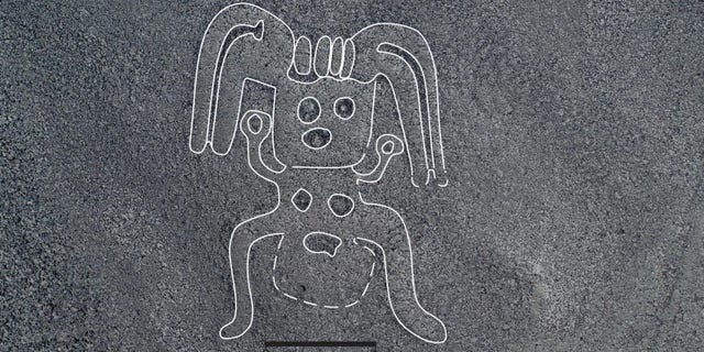 A processed picture of a newly-discovered Nazca humanoid figure.