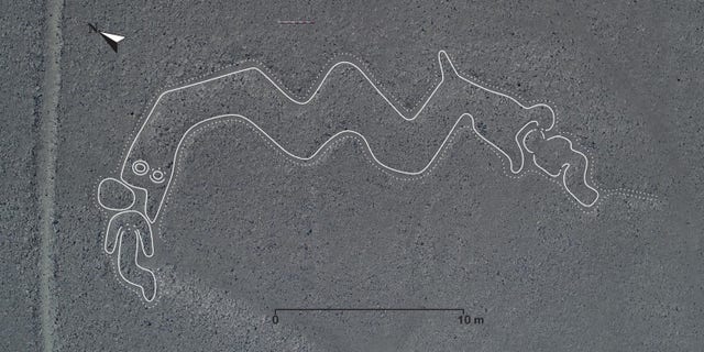 A newly-discovered two-headed Nazca Line snake that appears to be devouring two people. (Yamagata University)